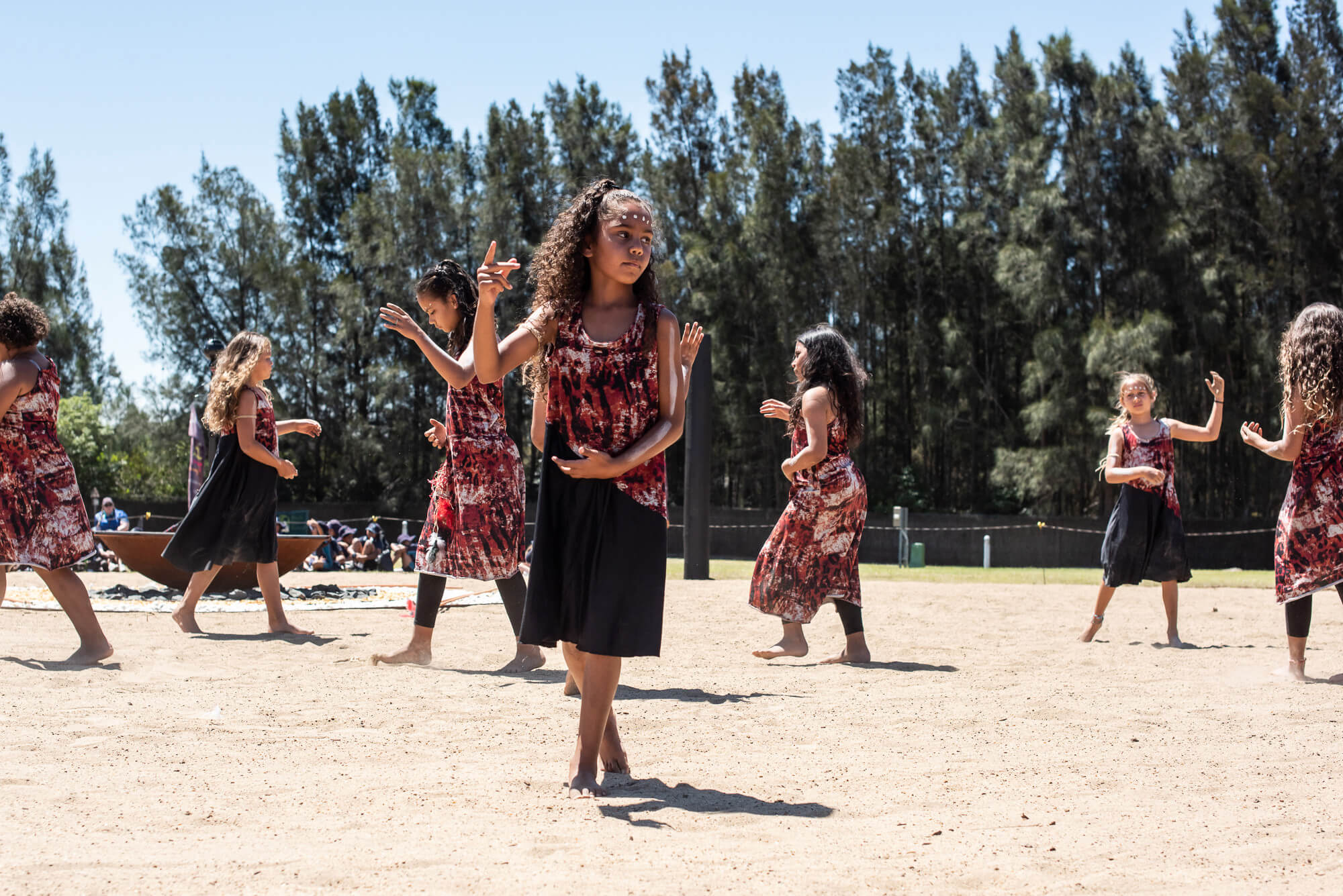 Young first nations woman dancing