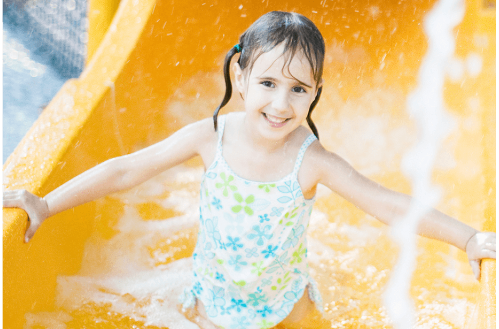 Child playing at Aquatic Centre playground
