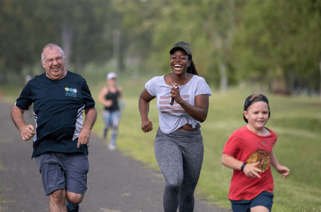 People jogging along path