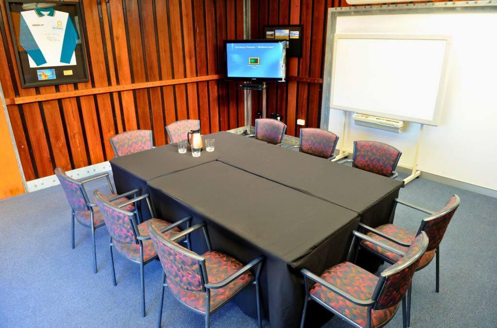 Image of table and chairs in a boardroom