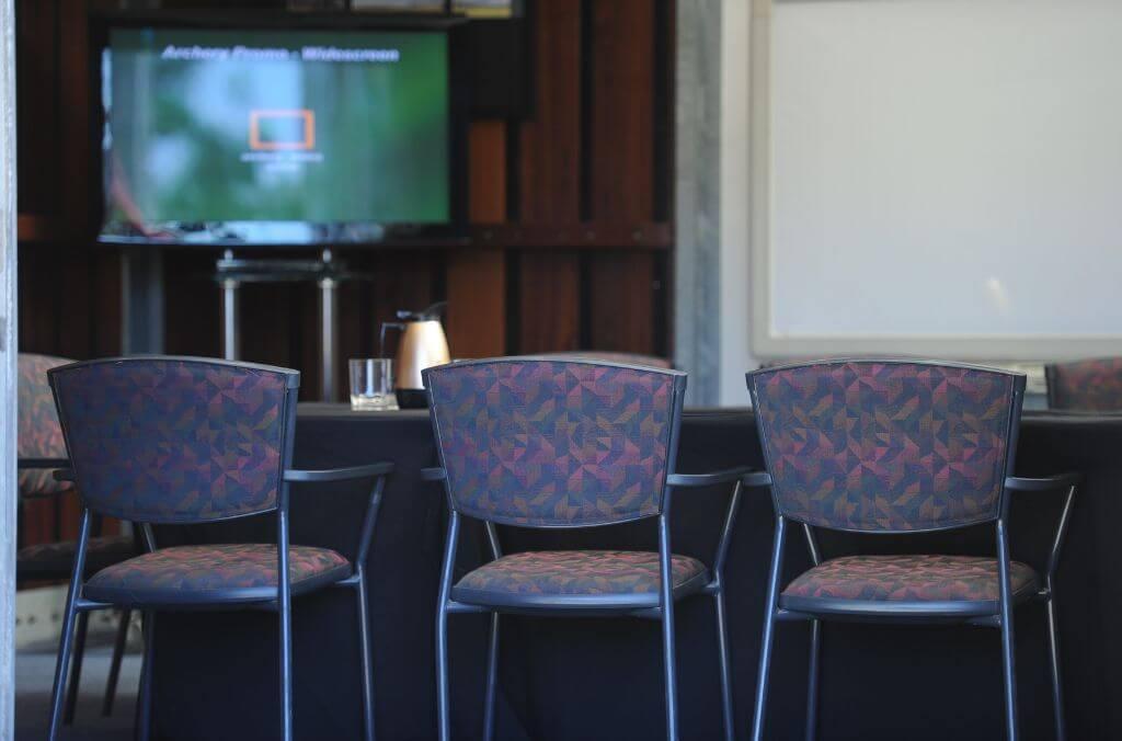 Image of table and chairs in a boardroom