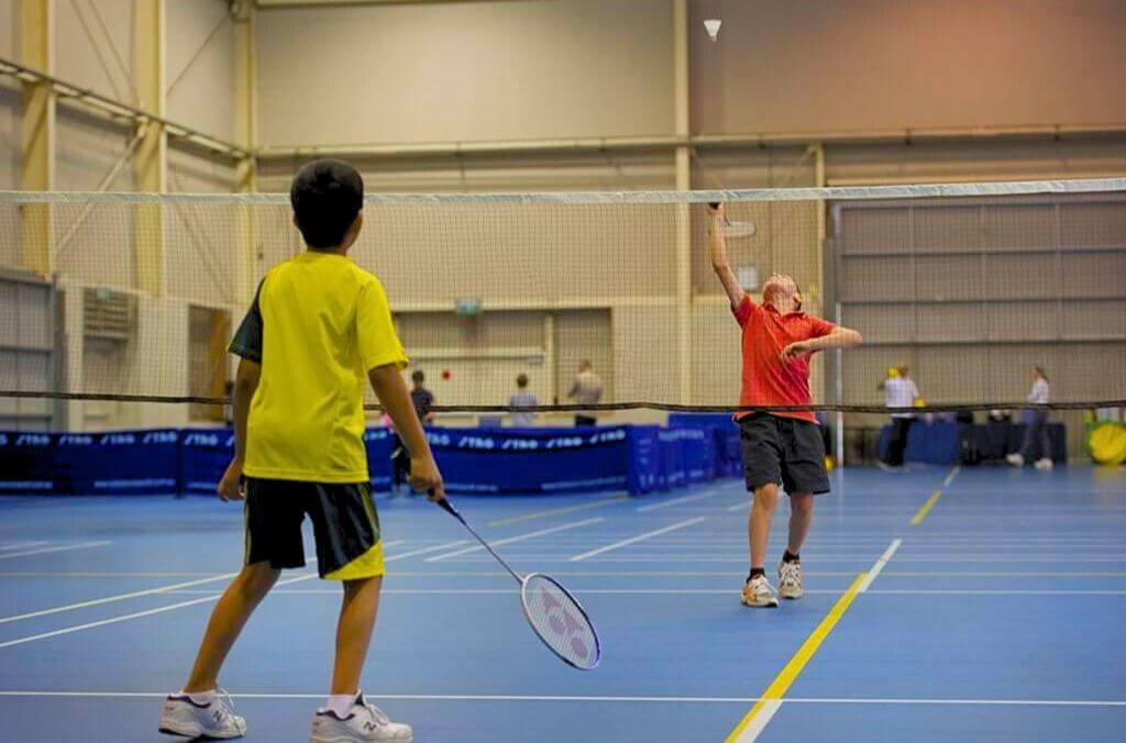 Kids playing  badminton